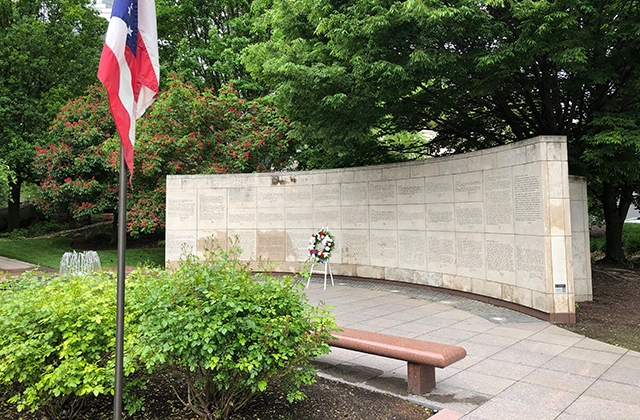 Read the letters on Veterans Plaza